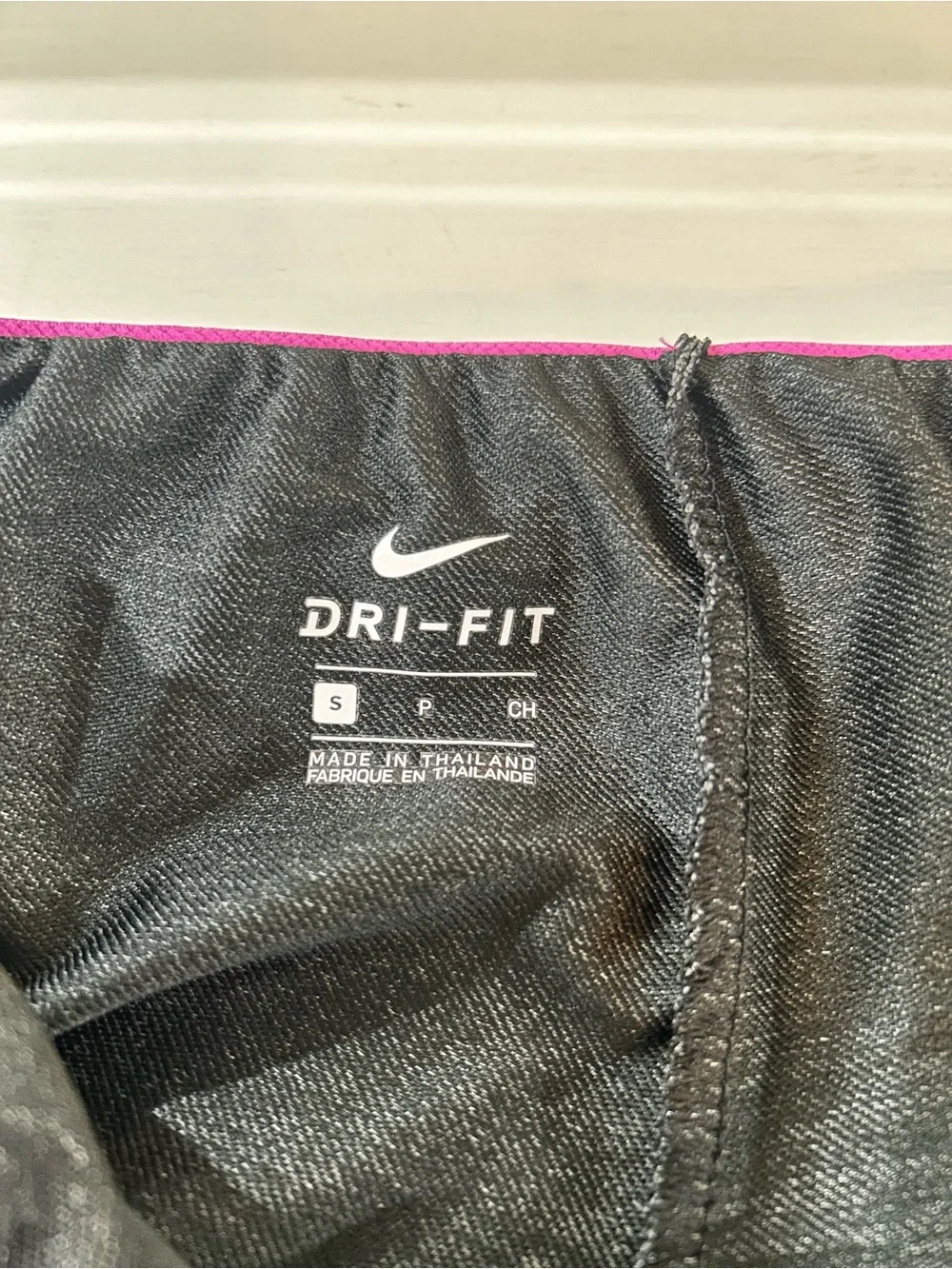 Nike Women's Gray Athletic Shorts with Pink Logo Waistband